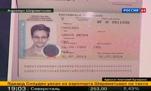 Edward Snowden in his new refugee documents granted by Russia